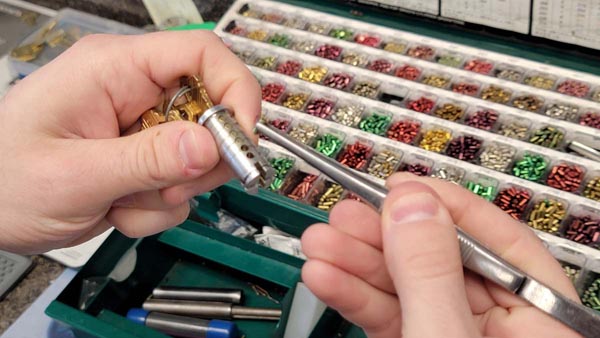 Lock rekeying: putting new pins in the cylinder